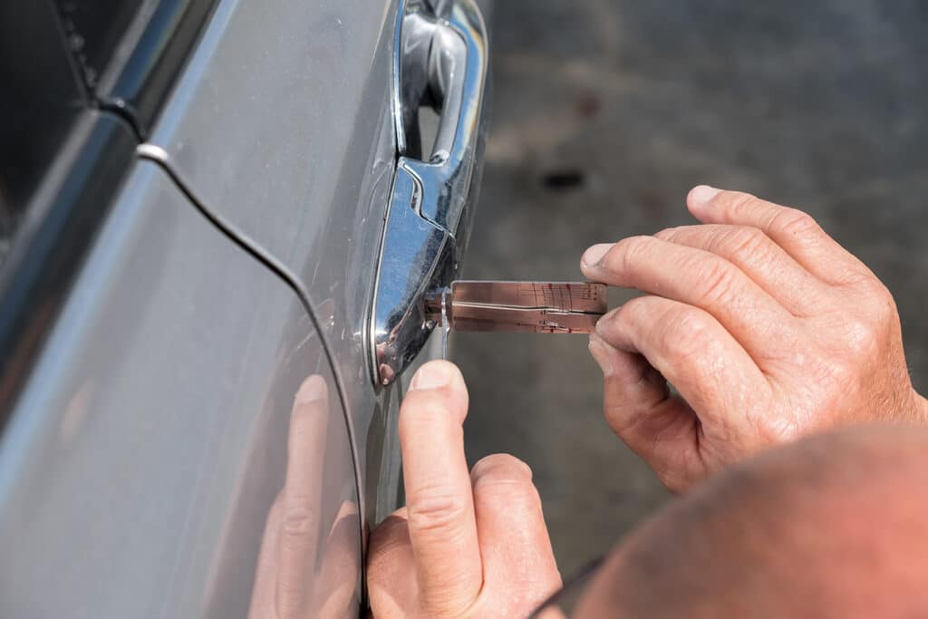 Locksmith Unlocking a Car Door